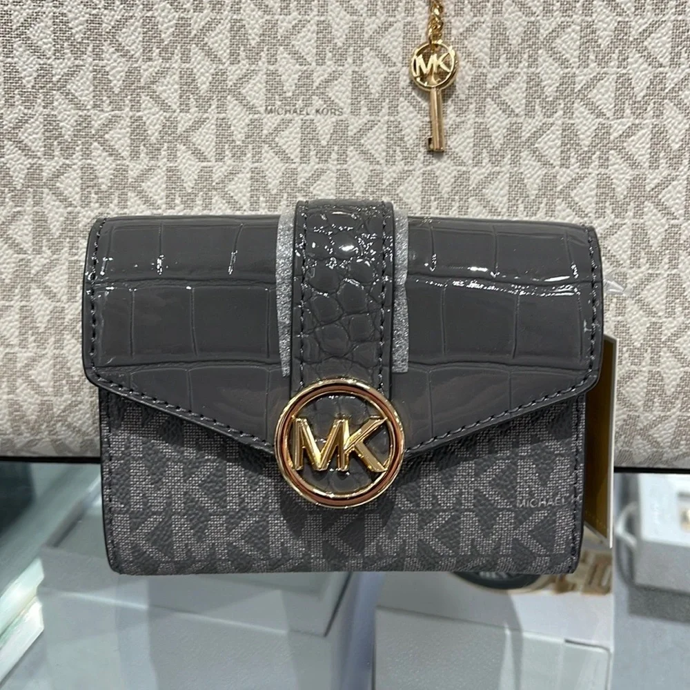 MICHAEL KORS CARMEN MEDIUM FLAP LOGO AND FAUX LEATHER WALLET  HEATHER GREY MULTI